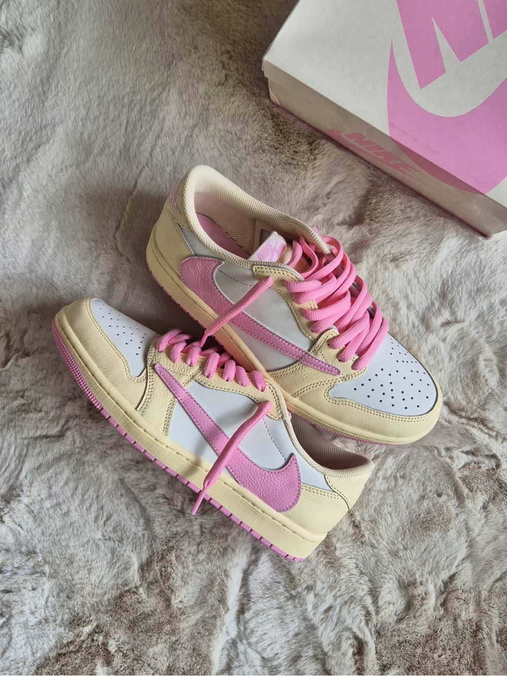 Travis Scott Women’s Low-Top Sneakers in Pink, Cream, and White